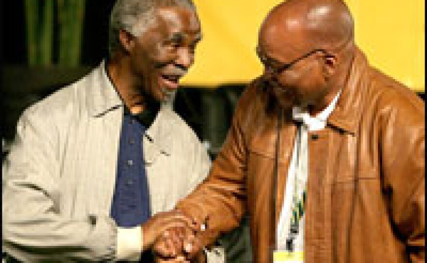 Outgoing ANC President Thabo Mbeki (left) congratulates Jacob Zuma, newly elected leader of South Africa's ruling African National Congress, on Dec. 18, 2007, in Polokwane, South Africa. Zuma defeated Mbeki, who retains the presidency of the country until 2009.