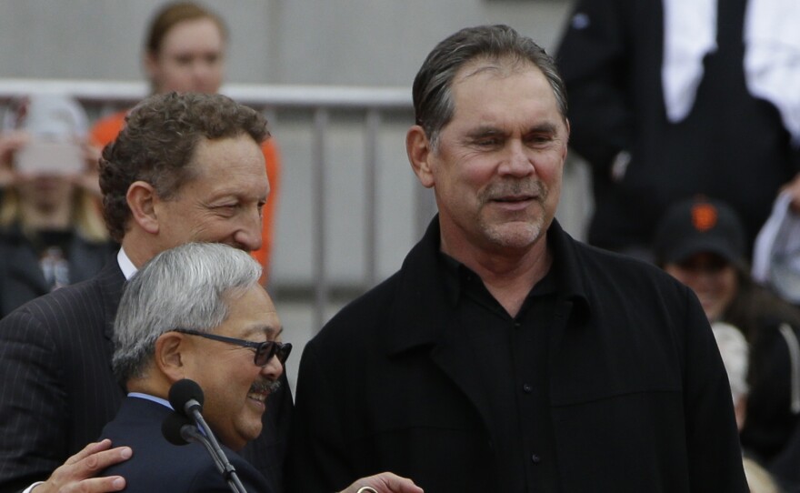 San Francisco Giants manager Bruce Bochy, right, had two heart stents inserted Thursday. He's seen here during the Giants' World Series victory parade last year.