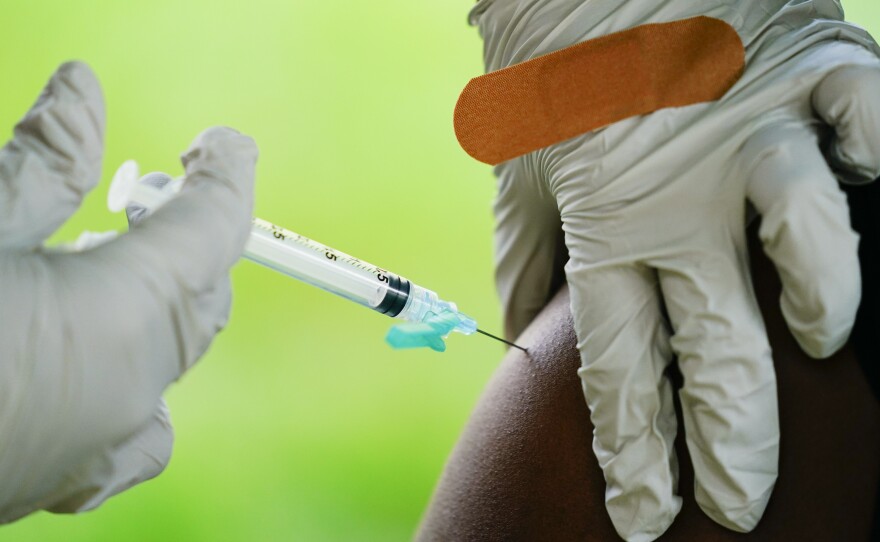 A CDC advisory panel recommended an extra Pfizer COVID-19 vaccine dose only for those who are 65 or older or run a high risk of severe disease.