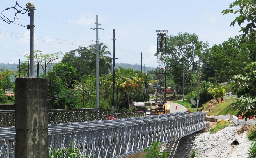 In Utuado, Puerto Rico, construction work is still going on to replace a bridge destroyed in Hurricane Maria.
