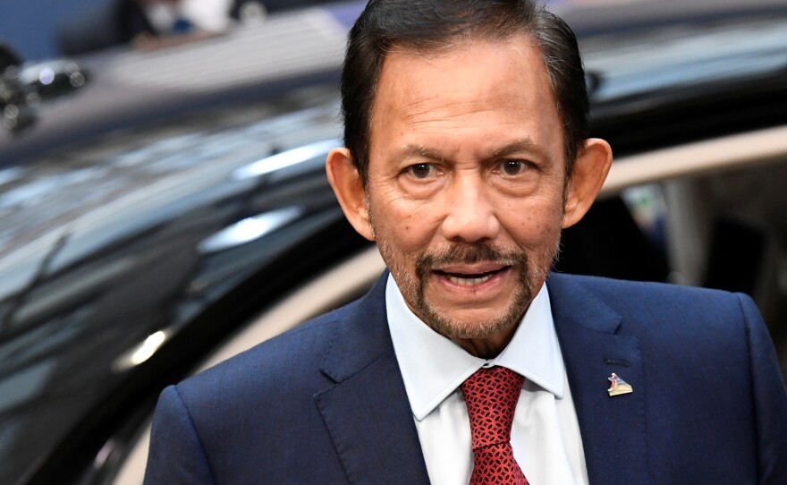 Sultan of Brunei Hassanal Bolkiah, seen arriving for meetings in Brussels last fall, now says his country will not impose the death penalty in cases involving gay sex and adultery.