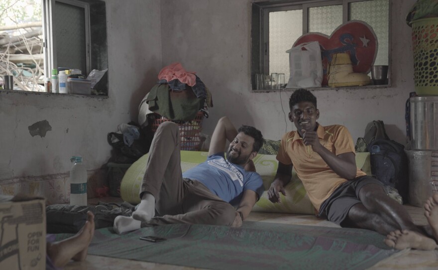 Ganesh and Rakesh relaxing at Rakesh’s home.