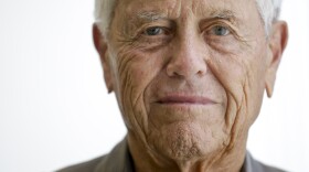 Malin Burnham poses for a portrait in his San Diego office, Sept. 23, 2014.