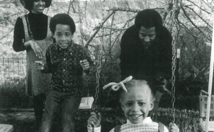Cheryl Morrow (right) is seen on a swing with her father, Willie Morrow in this undated photo.