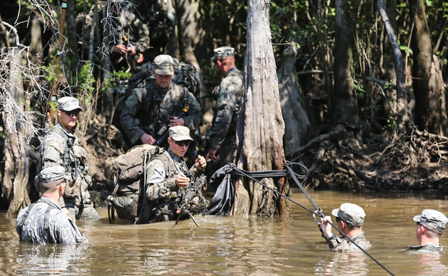 Two women will be among the soldiers who will graduate Friday from Army Ranger training. The Swamp Phase, seen here on Aug. 6, is part of the rigorous course.