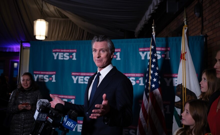 Gov. Gavin Newsom speaks to the media at a Proposition 1 victory event at The Citizen Hotel in Sacramento on Nov. 8, 2022.