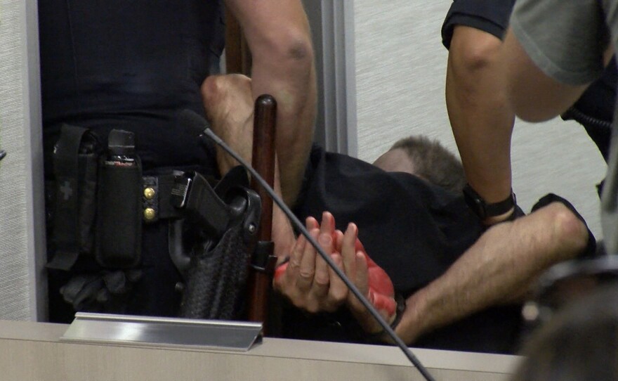 National City Police make an arrest during a city council meeting July 24, 2018.