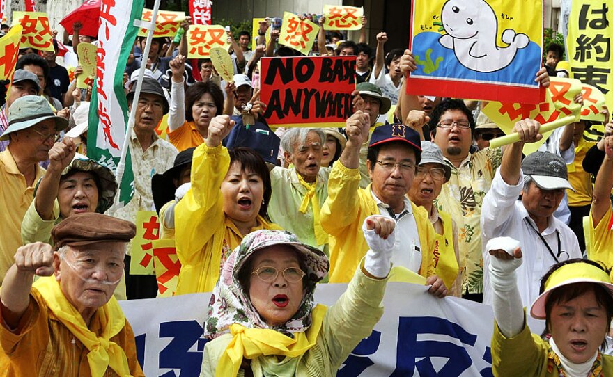 Okinawans protest May 23 in front of the local government office in the city of Naha against the U.S. Marine base on the island.