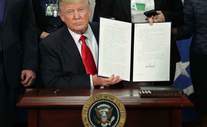 President Trump signs the first travel ban. The second ban has been stayed, for now, but some say it's still affecting American higher education.