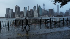 A darkened Manhattan is viewed after much of the city lost electricity due to the affects of Hurricane Sandy on October 30, 2012 in New York, United States.