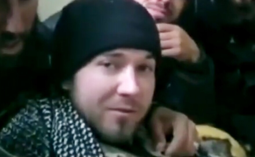 American Eric Harroun threatened Bashar Al-Assad on Facebook and YouTube. He spent six weeks fighting with a rebel army, a journey that did not end well for him.