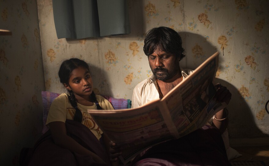 Just like his character Dheepan, Antonythasan Jesuthasan was a separatist fighter in Sri Lanka's civil war. He fled the country and eventually came to France illegally. He's pictured above with Claudine Vinasithamby (Illayaal).