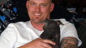 Leif Meisinger, a former Army gunner, says getting Spyder was one of the best things that ever happened to him. He credits his canine companion with helping to ease his PTSD.