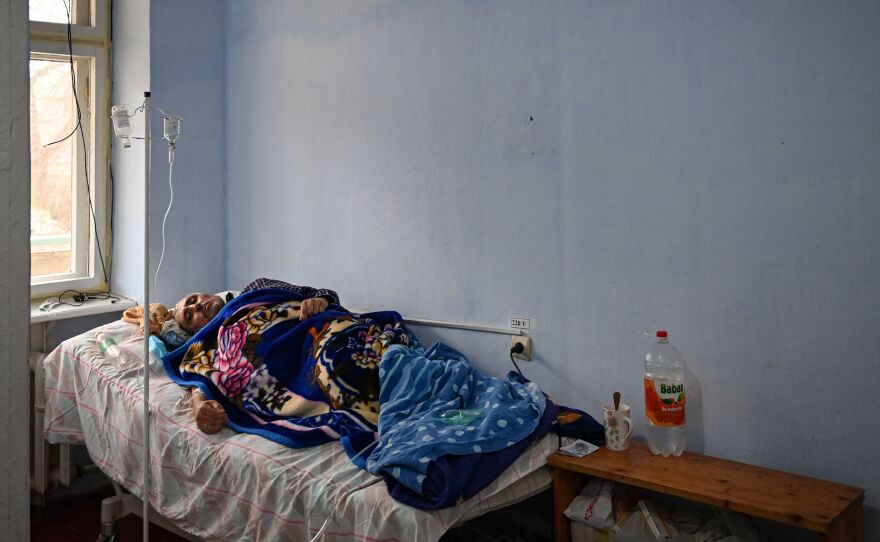 A patient rests at the COVID ward of the regional hospital in Leova, Moldova, on March 23. Moldova remains one of the poorest countries in Europe and has relied on vaccine donations from Romania and COVAX, a program that aims to distribute the world's vaccines more equitably.