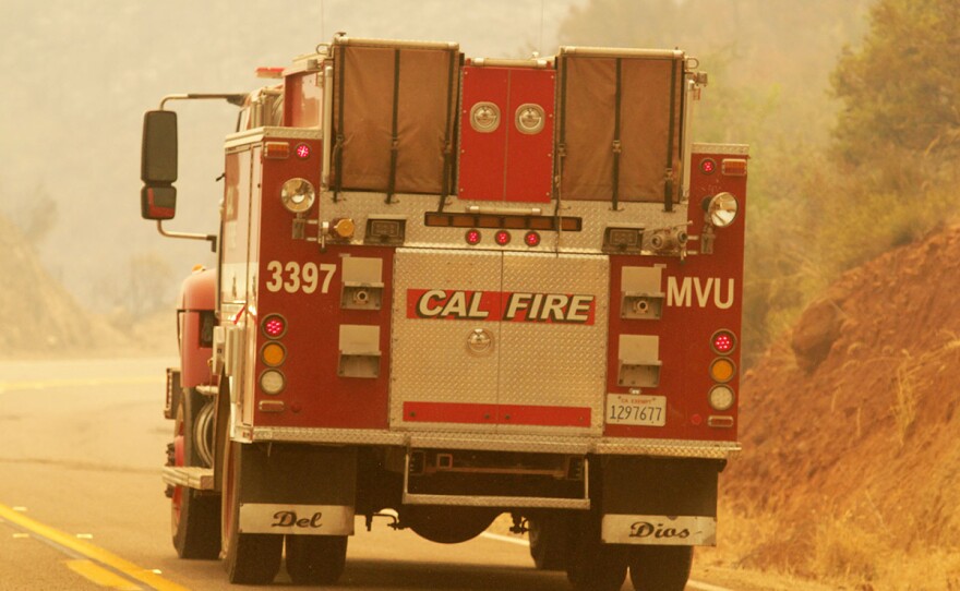 A Cal Fire truck drives drives down a road during the Valley Fire, Sept. 7, 2020. 