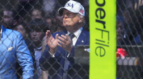 President Donald Trump applauds after Justin Gaethje defeated Ilia Toupruia in the lightweight championship bout at UFC Freedom 250 on the South Lawn of the White House, Monday, June 15, 2026, in Washington.