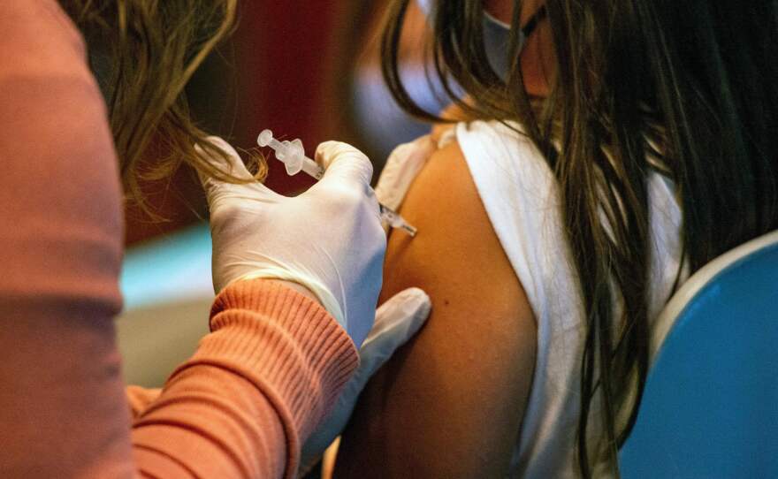 Doctors have been trusted sources of medical advice throughout the pandemic. Experts believe the handful who spread misinformation are fueling vaccine hesitancy.
