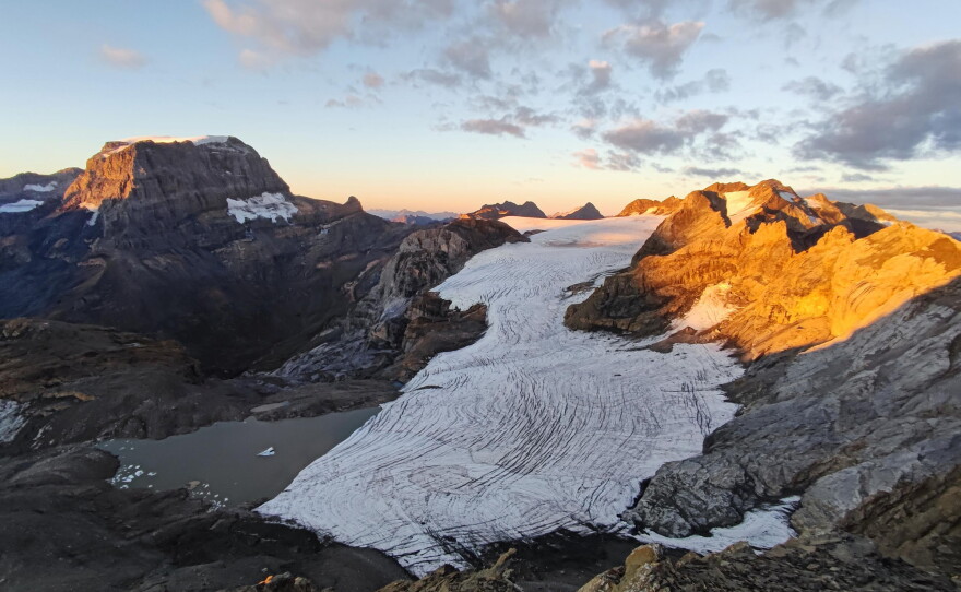 A Swiss glacier shows the effects of years of ice loss, with exposed rock replacing ice that once covered the landscape.