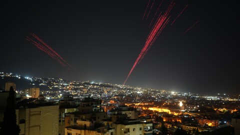 Tracer rounds illuminate the night sky as people fire live ammunition and fireworks into the air as a ceasefire was beginning between Israel and Hezbollah, in Beirut, Lebanon, in the early hours of Friday.