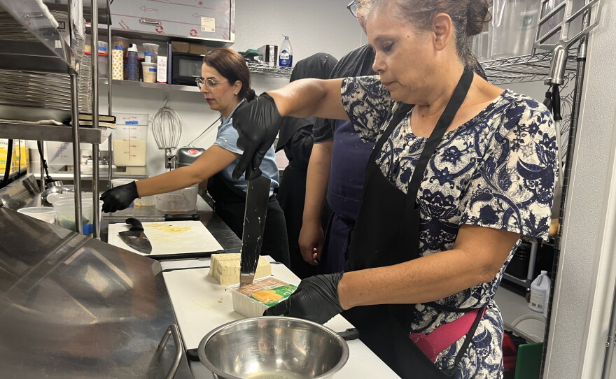 Make Projects participants prepare food inside the organization's cafe in Normal Heights, Aug. 21, 2026.