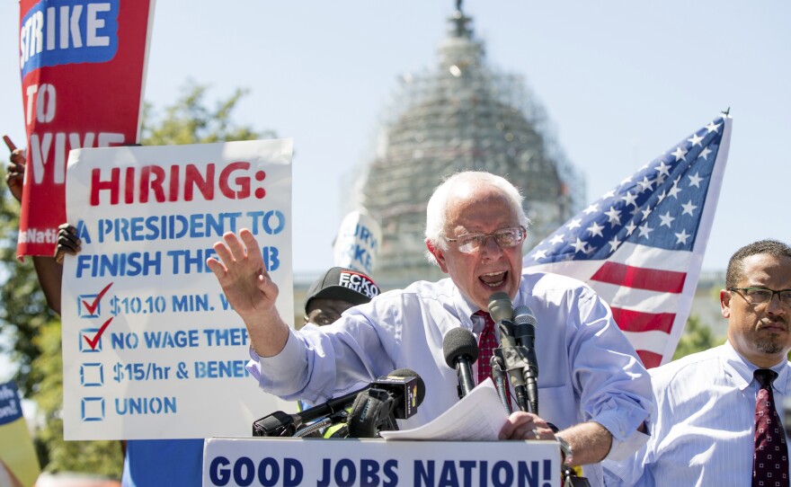 Democratic presidential candidate Sen. Bernie Sanders speaks during a 2015 rally to push for a raise to the minimum wage to $15 an hour.