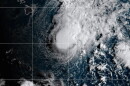 This NOAA satellite image taken Saturday, Aug. 22, 2026, shows Tropical Storm Moke advancing towards Hawaii in the Pacific Ocean.