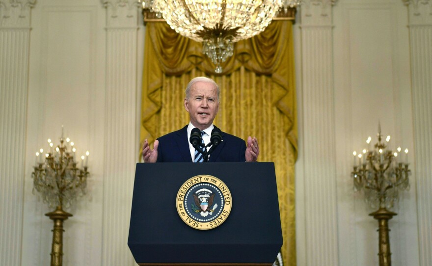 President Biden announces new sanctions against Russia after its invasion of Ukraine in the East Room of the White House on Thursday.