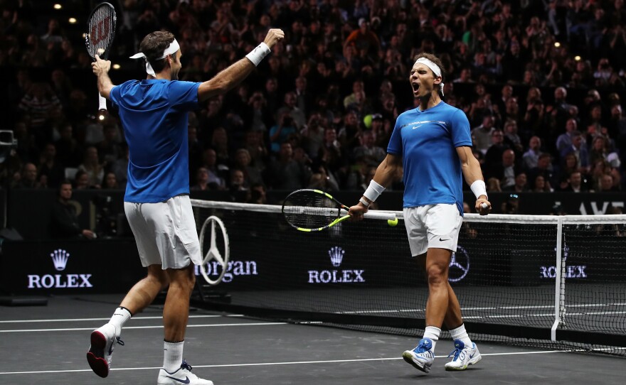 Roger Federer and Rafael Nadal celebrate during the Laver Cup in Prague, Czech Republic, in September 2017.