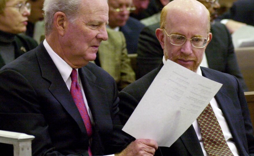 Former Secretary of State James A. Baker (left) confers with attorney Ben Ginsberg before the start of a hearing in the Florida Supreme Court in the days after the 2000 election.