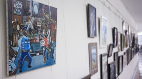 A painting by David Pulphus hangs in a hallway displaying paintings by high school students selected by their member of congress on Capitol Hill in Washington, Jan. 5, 2017. 