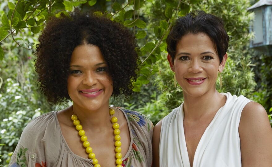 Suzanne (left) and Michelle Rousseau act as the official culinary hostesses for the Jamaican Tourist Board.