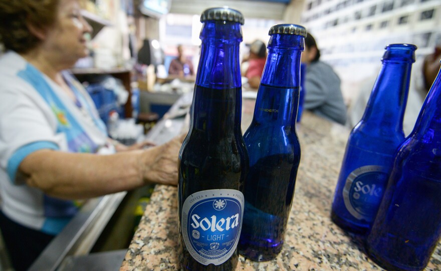 A barley shortage caused Venezuela's biggest beer producer, Polar, to stop production.