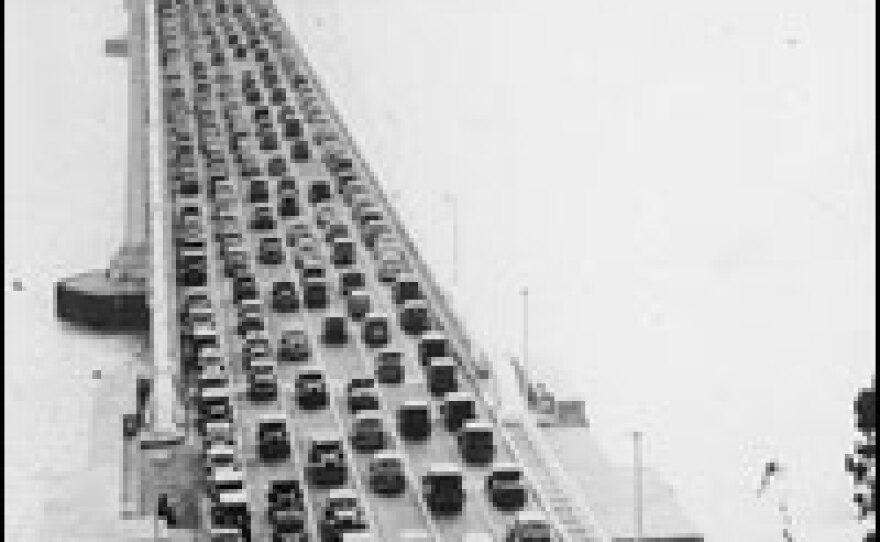 Cars cross the San Francisco-Oakland Bay Bridge shortly after it opened in 1936. In its first year, the bridge served 9 million vehicles. Determining how many vehicles, and what kind of vehicles, will cross a bridge on a daily basis is not merely academic. It affects the stress — or load — on the bridge, and therefore, its lifespan and maintenance schedule.