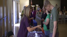 Veterans learn about benefits available to them at a San Diego County expo in Balboa Park, Aug. 3, 2015.