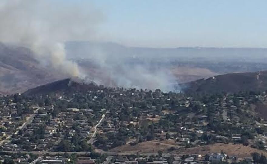 A view of a fire burning in Spring Valley from Mt. Helix, August 17, 2016.