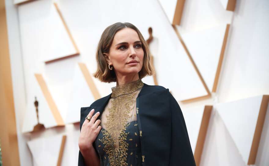 Natalie Portman arrives on the red carpet of The 92nd Oscars® at the Dolby® Theatre in Hollywood, CA on Sunday, February 9, 2020. Look closely to the edge of her cape for the names of all the women directors the Academy ignored in the Best Director category.