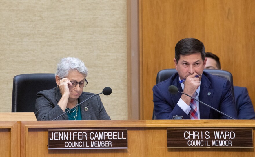 San Diego City Councilmember Chris Ward is shown seated next to Councilmember Jennifer Campbell at a council meeting on Nov. 19, 2019.