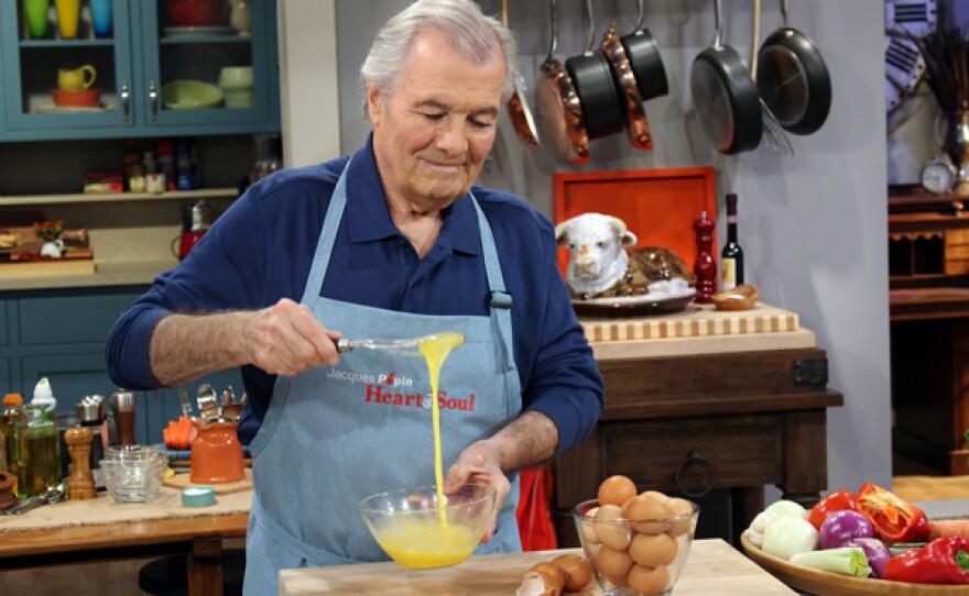 Chef Jacques Pépin whipping eggs on the set of HEART & SOUL.