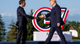 Emmanuel Macron, President of France, left, greets U.S. President Donald Trump during the G7 summit in Evian-les-Bains, France, Monday, June 15, 2026.