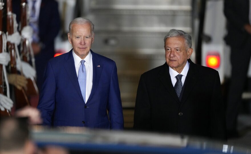 U.S. President Joe Biden walks with Mexican President Andres Manuel Lopez Obrador, at his arrival to the Felipe Angeles international airport in Zumpango, Mexico, Sunday, Jan. 8, 2023.