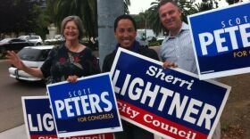 Sherri Lightner, Todd Gloria and Scott Peters campaign on Election Day.