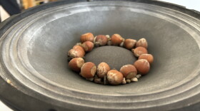 Hazelnuts bounce on a speaker at “Ess Whiteley: listening materials” at the Athenaeum Art Center in Logan Heights on Aug. 25, 2026.