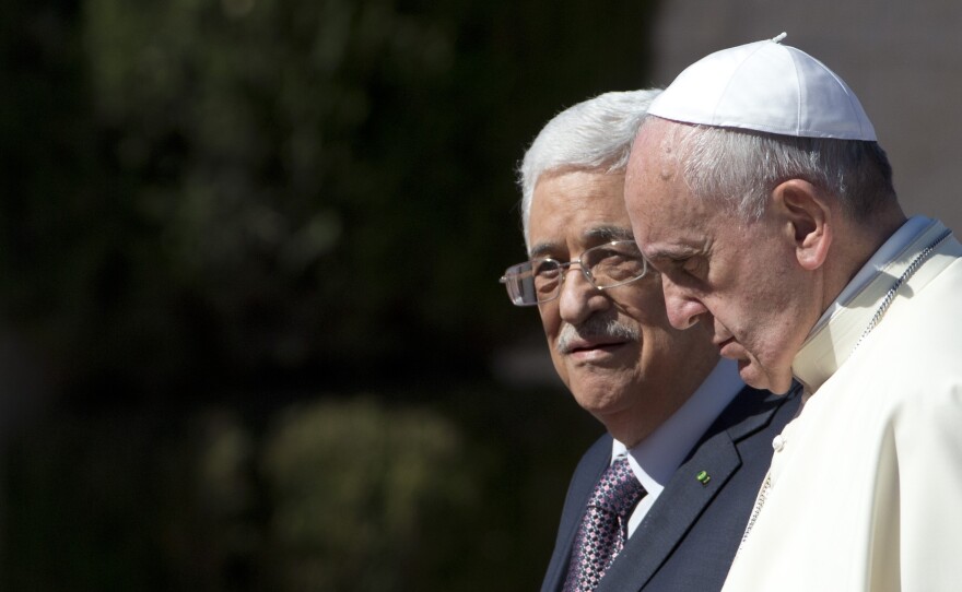 Pope Francis meets with Palestinian Authority President Mahmoud Abbas in the West Bank city of Bethlehem on May 25, 2014. The Vatican officially recognized the state of Palestine in a new treaty finalized today.