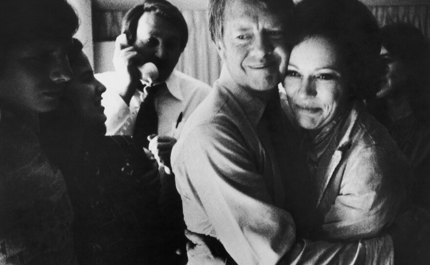 Democratic presidential candidate Jimmy Carter embraces Rosalynn after receiving the final news of his victory in the 1976 general election.
