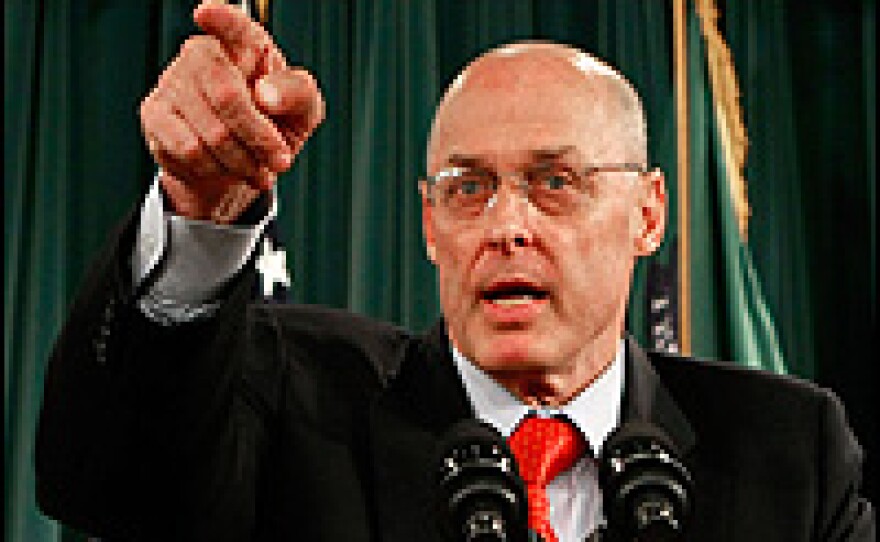 Treasury Secretary Henry Paulson took questions from reporters Wednesday. "We will use all of the tools we've been given to maximum effectiveness," he said.