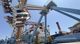 A ride at Belmont Park is shown with the Giant Dipper in the background on June 24, 2025.