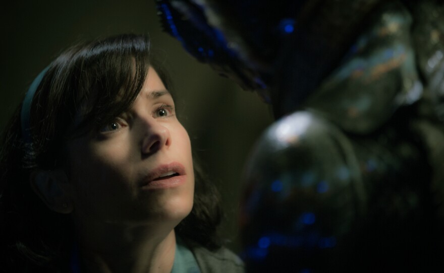 Elise (Sally Hawkins), a cleaning woman at a top secret facility, falls in love with specimen (played by Doug Jones) being experimented on by the government in "The Shape of Water."