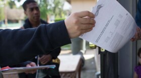 During their spring break, high school students volunteer to hand out voter registration forms in South Sacramento on March 24, 2016.