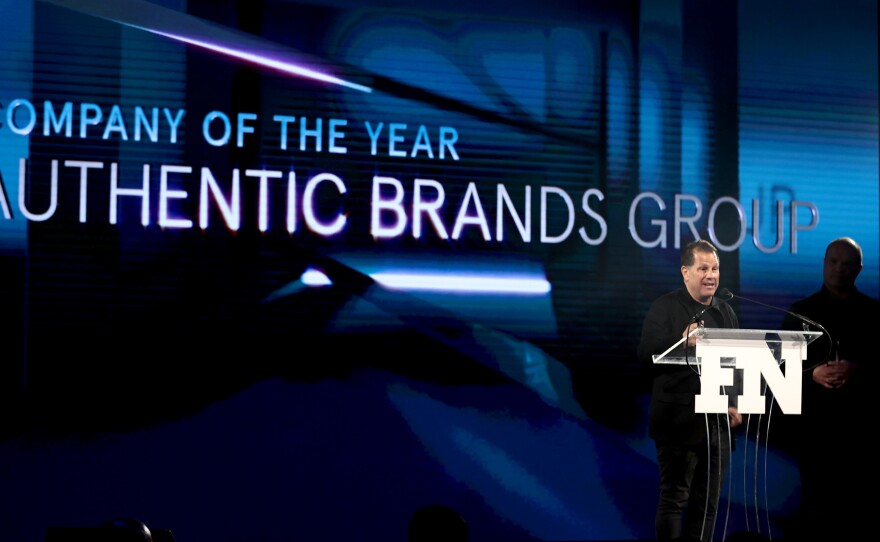 Authentic Brands Group CEO Jamie Salter accepts a Footwear News Achievement Award in 2021. That year, his firm said it would buy the Reebok brand from Adidas.