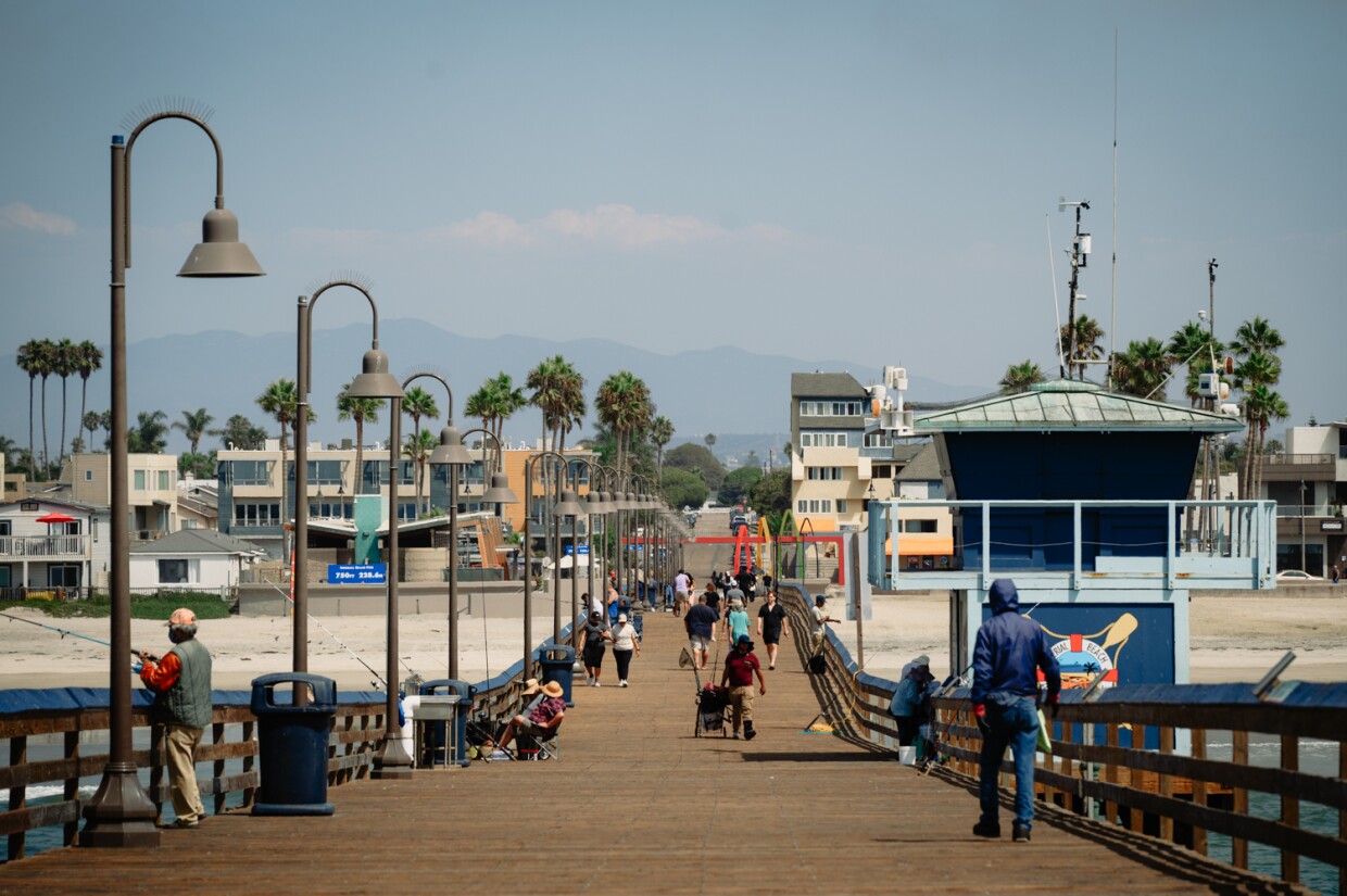 Visitors walk along the IB Pier in Imperial Beach on September 3, 2024.
